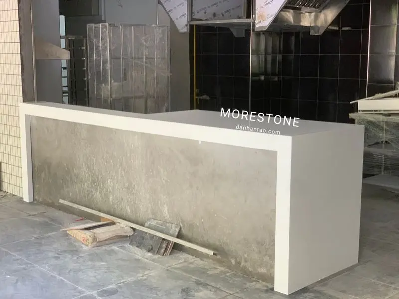 Thi công quầy lễ tân mặt đá 4 quầy lễ tân đá nhân tạo
